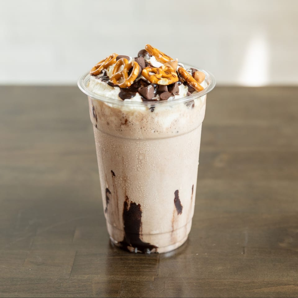 Chocolate shake topped with pretzels